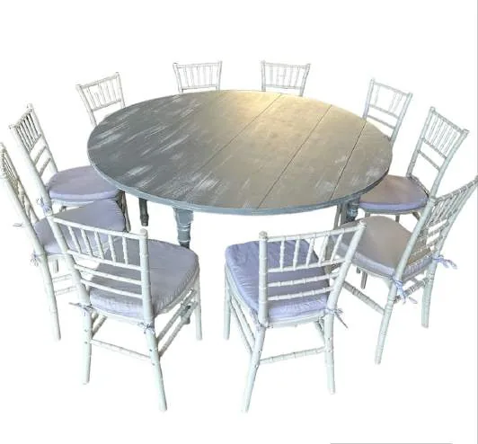 Renta de mesa redonda gris con sillas para eventos en CDMX
